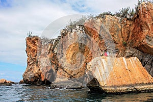 Small maria chapel next to ocean photo