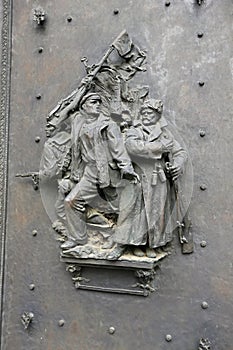 Small metal figures of the russian soldiers on the door