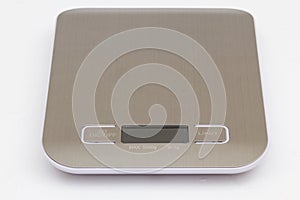 Small modern digital Kitchen scale over Isolated white background