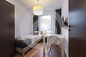 Small, modern sleeping room interior design