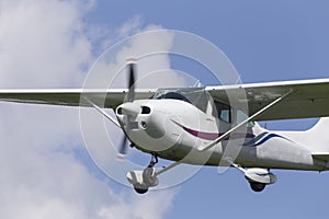 Small motorplane in the air photo