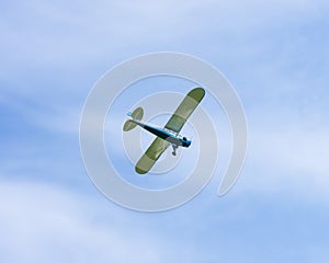 Small motorsport plane from below.