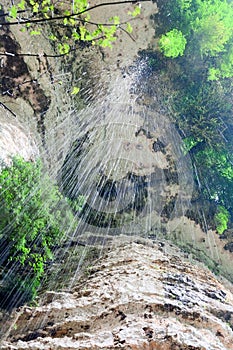 Small mountain creek with waterfall at the Abkhazian forest, Kodori gorge