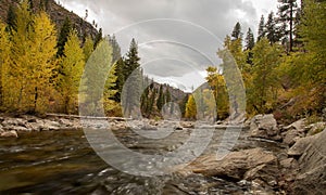 Small mountain river in the fall