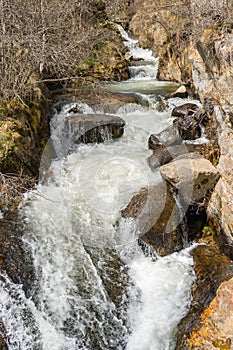 Small mountain river with rocks and waterfall.Nature landscape background