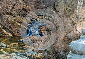 Small mountain stream waterfall