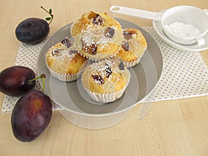 Small muffins with plums