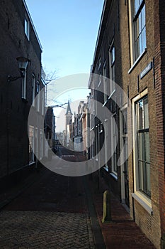 Small narrow street in center of Gouda