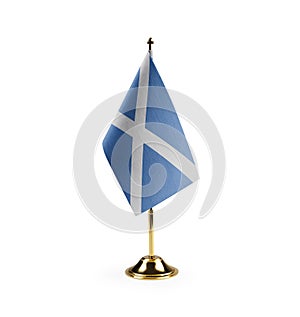 Small national flag of the Scotland on a white background