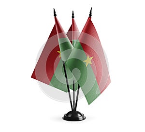 Small national flags of the Burkina Faso on a white background