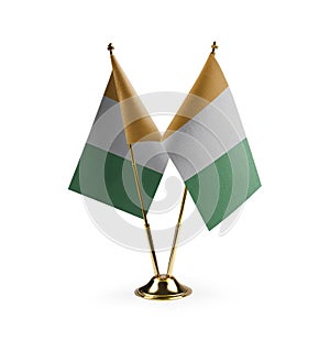 Small national flags of the Cote dIvoire on a white background