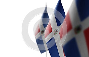 Small national flags of the Dominicana on a white background