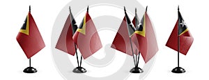 Small national flags of the East Timor on a white background