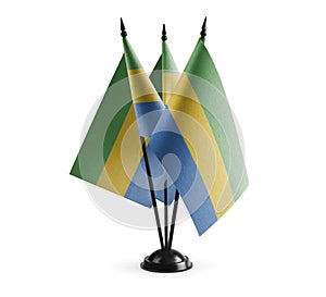 Small national flags of the Gabon on a white background