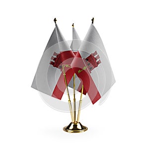 Small national flags of the Gibraltar on a white background