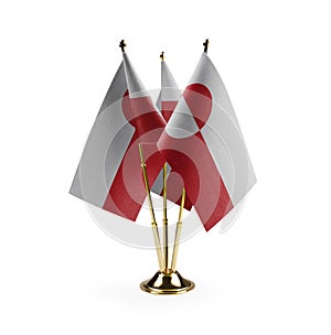 Small national flags of the Greenland on a white background