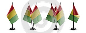 Small national flags of the Guinea on a white background