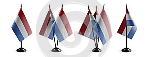 Small national flags of the Netherlands on a white background