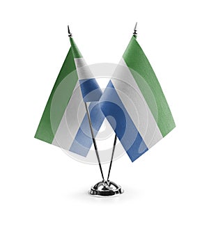 Small national flags of the Sierra Leone on a white background