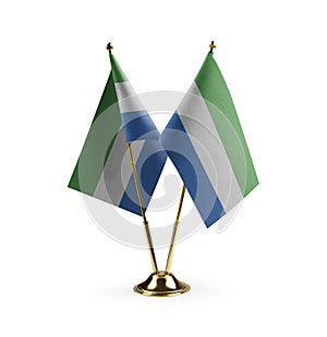 Small national flags of the Sierra Leone on a white background