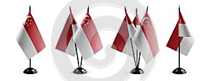 Small national flags of the Singapore on a white background