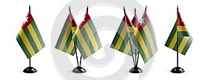 Small national flags of the Togo on a white background