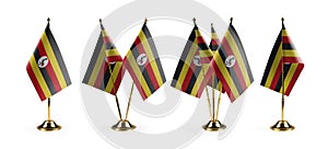 Small national flags of the Uganda on a white background