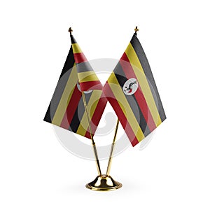 Small national flags of the Uganda on a white background
