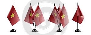 Small national flags of the Vietnam on a white background