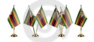 Small national flags of the Zimbabwe on a white background