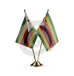 Small national flags of the Zimbabwe on a white background