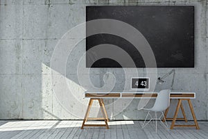 Small neat minimalist grey office with chalkboard