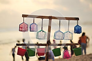 small nets and buckets for children's toys on the beach