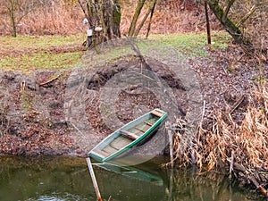 Oared boat near the river coast
