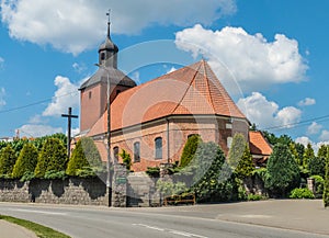 Small old baroque brick church in village of Stezyca, Poland.