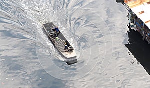 Small and old long tailed boat.