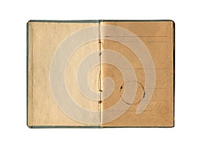 small old notebook with vintage yellow brown paper and antique seal stamp and empty first page open and isolated on white
