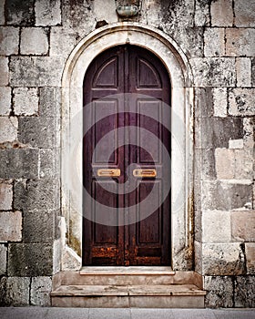 Small old wooden church door