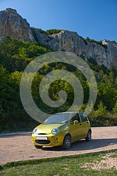 Small olive green car