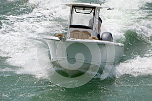 Small Open Sport Fishng Boat Speeding on Biscayne Bay