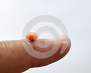 Small orange pill