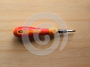 Small orange precision screwdriver