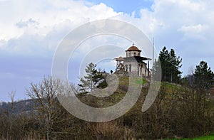 small orthodox church on a hill