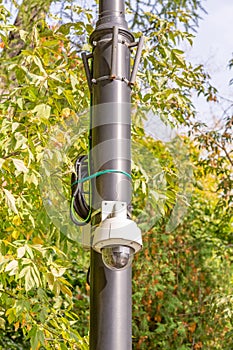 Small outdoor security camera on a lamppost