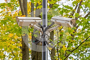 Small outdoor security camera on a lamppost