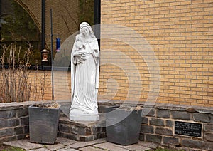 Small outside memorial dedicated in loving memory to all unborn children at a Catholic Church in Edmond, Oklahoma.