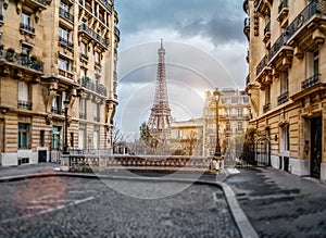 The eifel tower in Paris from a tiny street