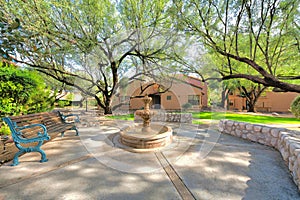 Small park with bench and water fountain in a subdivision at Tucson, Arizona