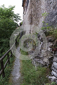 Small path with wooden handrail