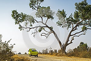 Small pickup van on way to Murhu on dusty road Ranchi